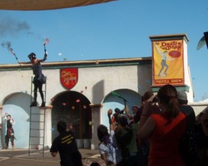 Standing on a ladder, exploding, and having balloons thrown at him.  This guy was entertaining.