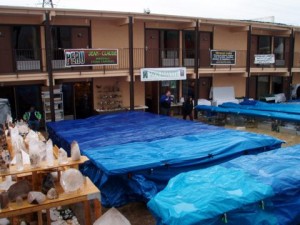 Rained out!  Check the motel rooms (mini showrooms) to the rear of the tarp.