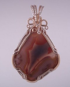 A stylish colorful Lake Superior Agate Pendant.