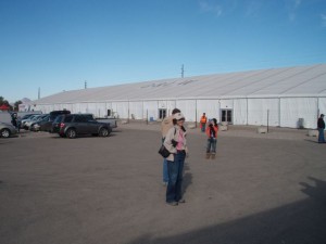 Massive hard sided tents are common for the shows.  We have found they do leak in the rain.