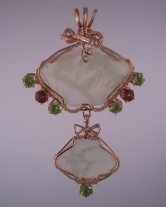 Prehnite with Peridot and Topaz.