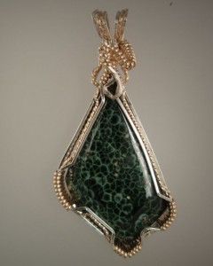 A gorgeous Greenstone with included Thomsonite.  A winner for sure!