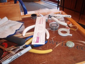 My workbench at Copper World.  Also notice the orange Laker "paint" agate on the bench. 