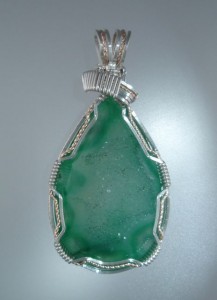 Someone will be pleased to own this Emerald colored Drusy.