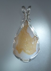 I threw a light on this great yellow drusy so you could see it shine.