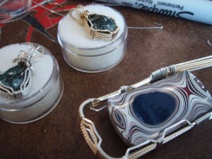 fordite-on-the-bench1 Two Greenstone pendants done and one Fordite pendant started.
