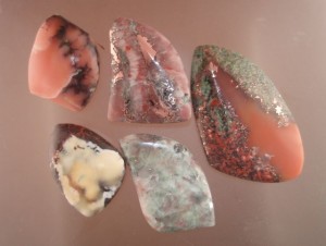 From left to right beginning at the top: Mesnard Datolite, Rose Quartz and Quartz with Copper, Franklin Datolite, Yellow Keweenaw Point Datolite, Patricianite with Silver and Copper.