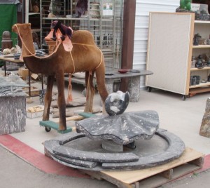 A stuffed camel guards a fossil water feature-only at Tyson Wells.