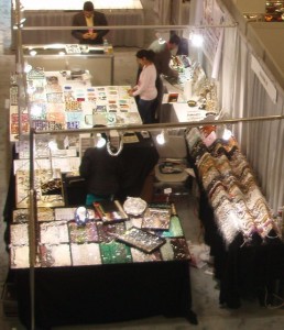 A typical booth at AGTA.  Great lighting enhancing many gemstones.