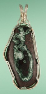 The Greenstone pendant I made from that rock.This pendant is almost 3" tall.  That's a biggun folks.