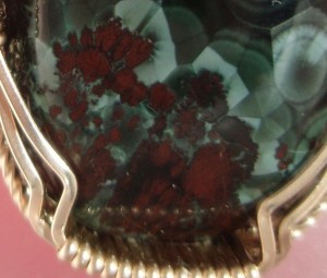 Close-up of the Cuprite in this Greenstone.