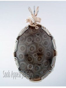 After removing the Petoskey cabochon, I re-wrapped the stone as it deserved.