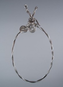 A quality Petoskey Stone was removed from this ugly wire pendant.