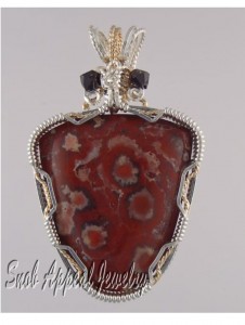 I added a pair of garnets to the top of this one.