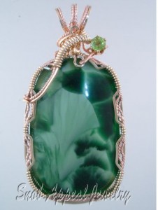 Blue/Green with a Peridot enhancer.