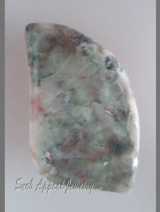 Pastel Patricianite with small Copper Inclusions. This was a massive chunk before slabbing.