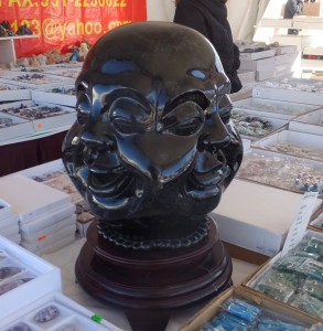 A four-faced obsidian Budda