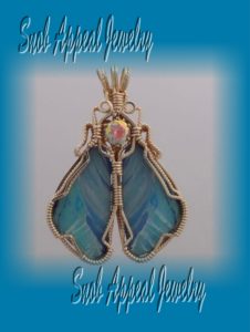 Blue Stone Jewelry includes An opal pendant 