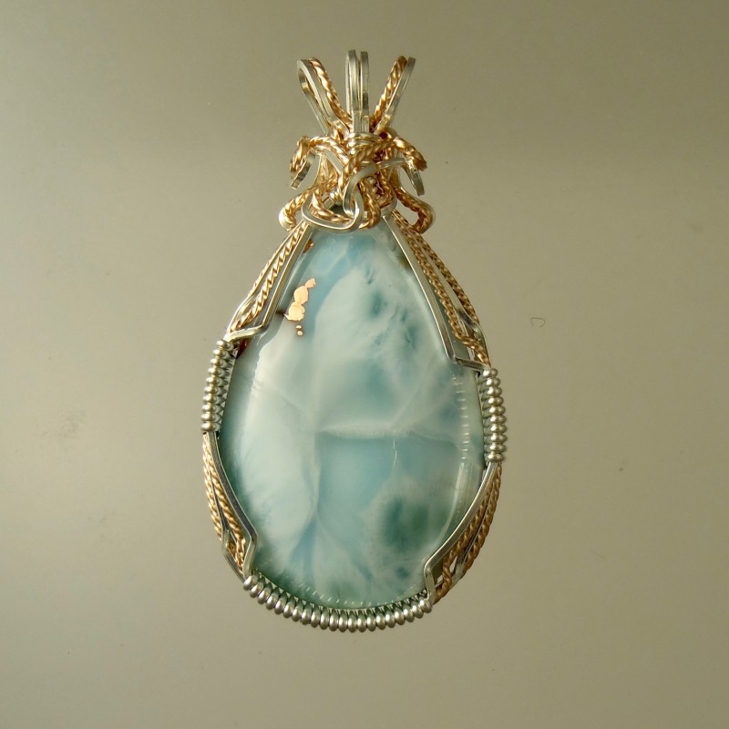 Beautiful Larimar pendants wire-wrapped in gold and silver wires