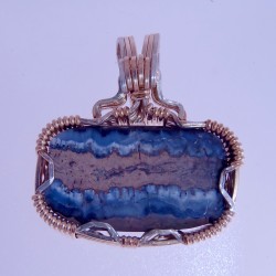 Once Bitten Mastadon Tooth Pendant