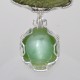 Profusely Green Petrified Wood Cat's Eye Jade Pendant